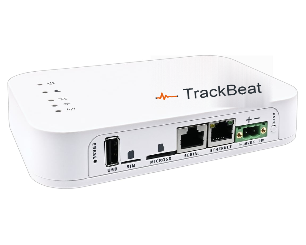 TrackBeat edge receiver — low industrial gateway with USB, SIM, microSD, serial, Ethernet and DC power connections along the front edge.